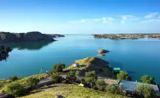 Земельные дары на берегу Капшагая: как родственники экс-президента и олигархи ловят удачу в мутной воде