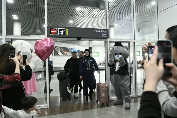 Столичные спортсмены, защищавшие честь страны в Японии, вернулись домой (2)