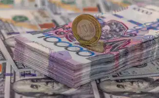Снижение базовой ставки Нацбанка приводит к резкому падению курса доллара на торгах в Казахстане 28 ноября