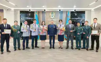 Министр внутренних дел Казахстана отмечает достижения спортсменов на юбилее 100-летия спортивного общества "Динамо"