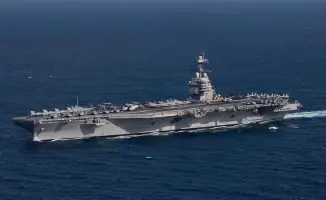 Авианосец 'Джеральд Р. Форд': гигантский корабль возвращается с морских просторов, как орел, покидающий бурю, после 300 дней в боевом полете.